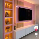 Wall-to-wall 8-by-8 tv console with LED lights and compartments.