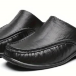 Black half-cut stylish shoe.