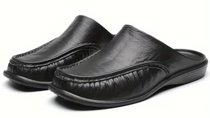 Black half-cut stylish shoe.