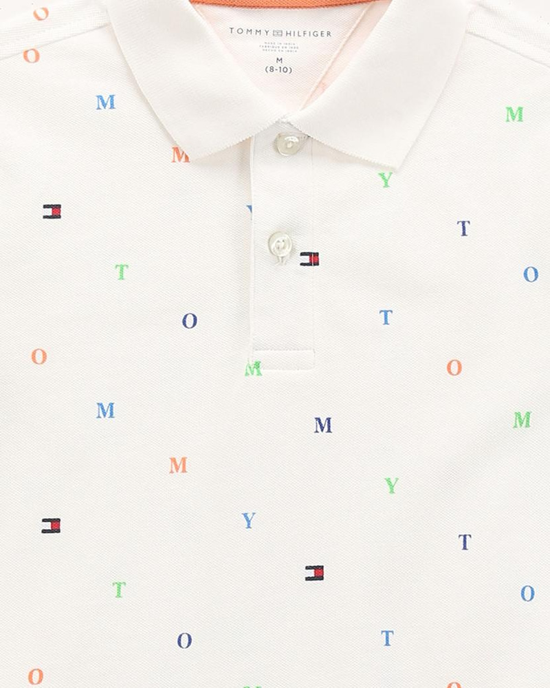 Tommy Hilfiger Kids Boys Monogram Print Critter Polo Shirt in White with Multicolored Embroidered Flags